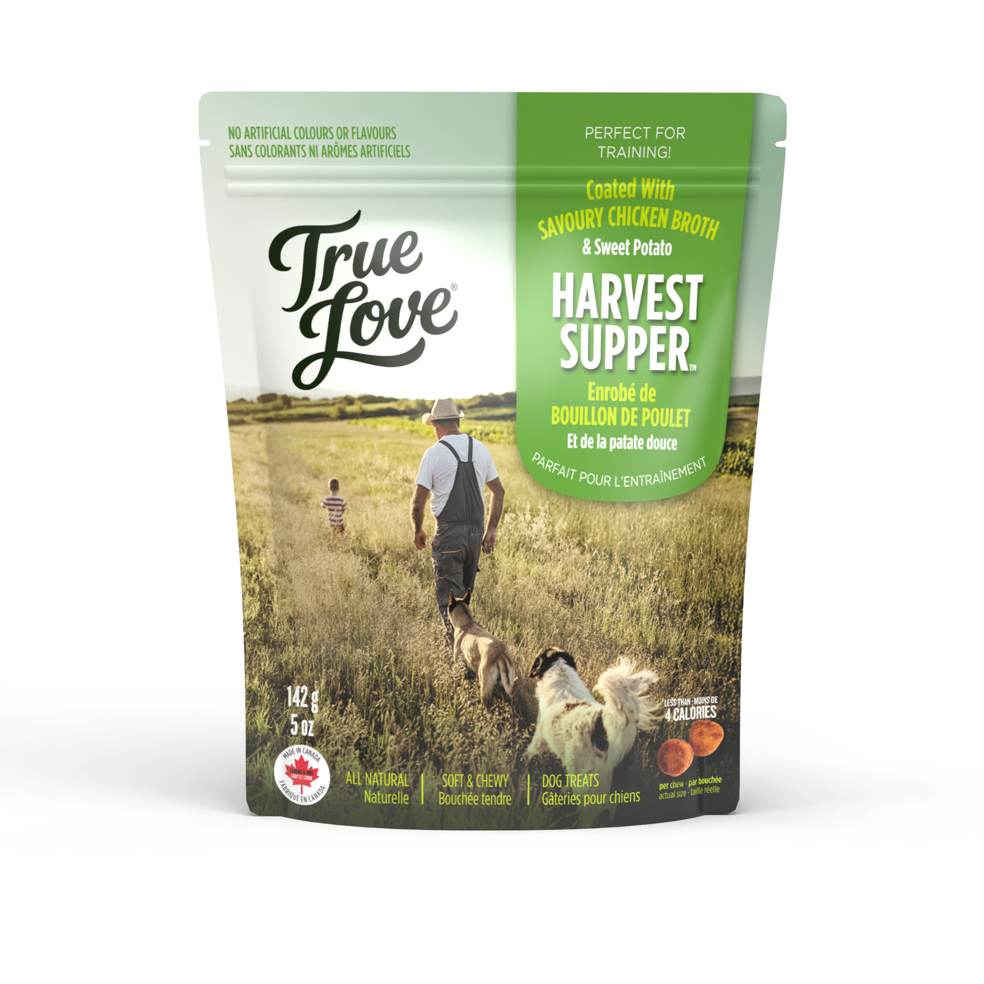 Bag of True Love dog treats with a prairie setting and two dogs on the front. Harvest Supper flavour - savoury chicken broth and sweet potato.