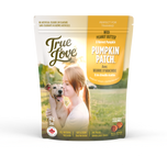 Bag of True Love dog treats with a girl hugging her dog on the front. Pumpkin Patch flavour - peanut butter and harvest pumpkin.