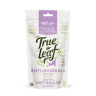 Front of the Trueleaf Hairball Support chews for cats pouch, white and green, with cat photography and product details.